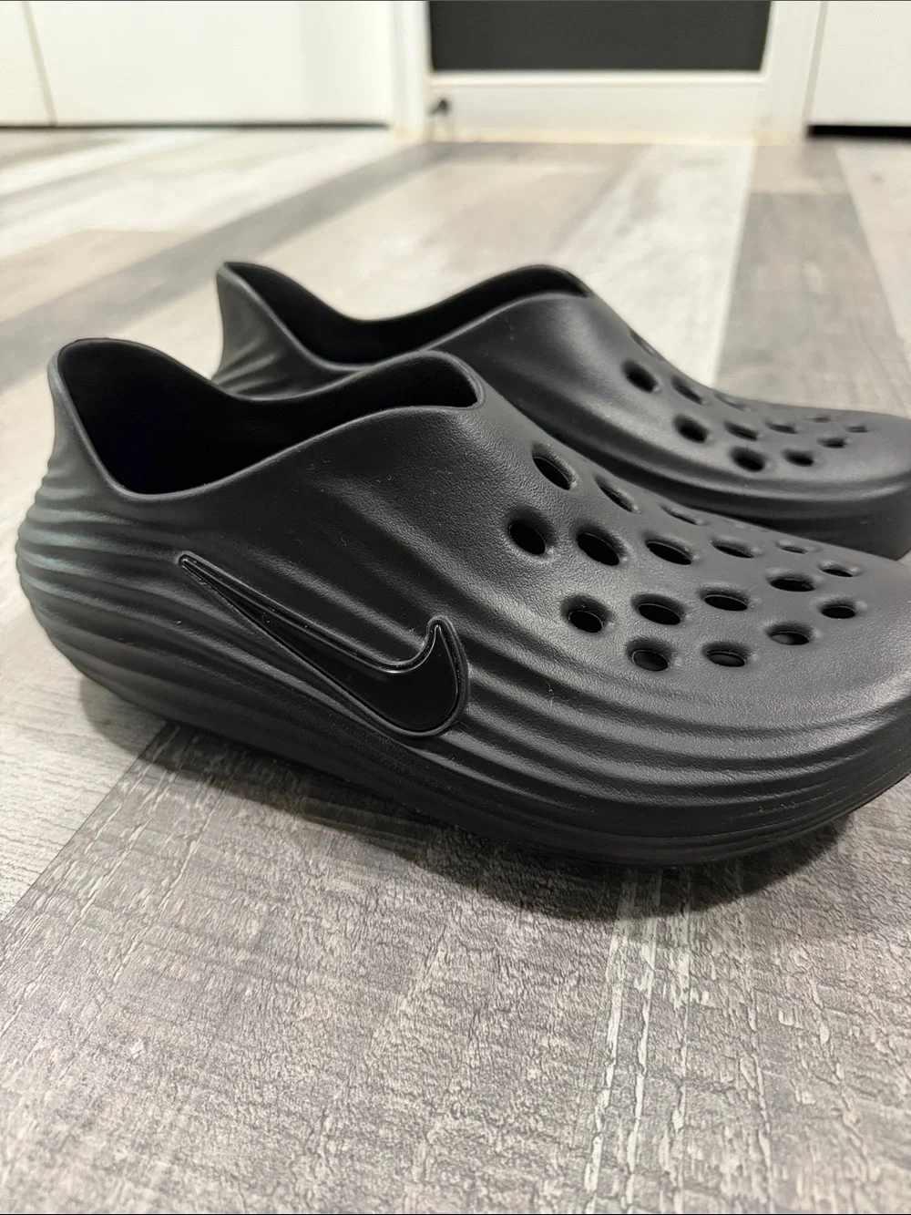 Nike Black ReactX Rejuven8 Slip-Ons